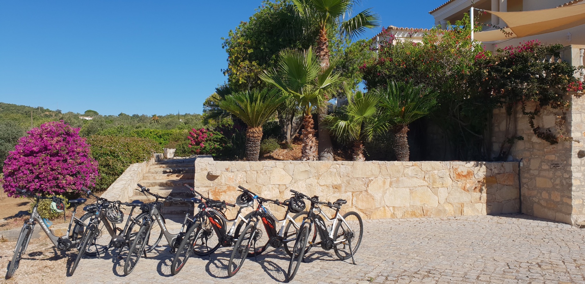 Bikes by the bougainvillea at Casa Amani, Algarve